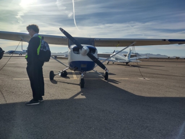A detailed accident report analyzing the mid-air collision between a Cessna 172S Skyhawk SP and a Lancair 360 MK II at Marana Regional Airport on February 19, 2025. The report includes information on the timeline, aircraft involved, pilot actions, airport conditions, and the role of the uncontrolled airspace in the incident. Investigative focus areas include flight path data, eyewitness testimony, FAA regulations, and the implications for future aviation safety policies. The findings highlight the challenges of operating in non-towered environments and the necessity for improved situational awareness and collision avoidance measures.