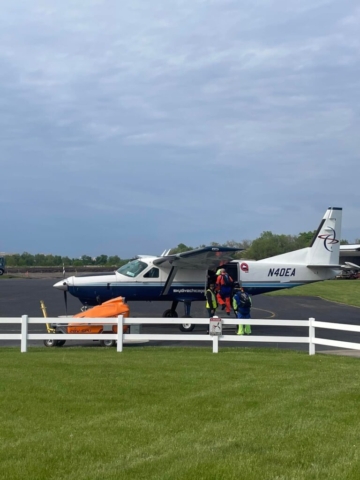 Accident report detailing the crash of a Cessna 208A Cargomaster (N40EA) on February 14, 2025, near Cody’s Corner, Florida. The report includes details on the aircraft’s departure from Sebastian-Roseland Municipal Airport, its loss of contact with air traffic control, and the discovery of the wreckage in a densely wooded area. Investigative efforts by the Flagler County Sheriff’s Office, FAA, and NTSB are discussed, along with potential causes under review, including mechanical failure, medical incapacitation, or environmental factors. The report also includes statements from Eagle Air Transport and authorities overseeing the investigation.
